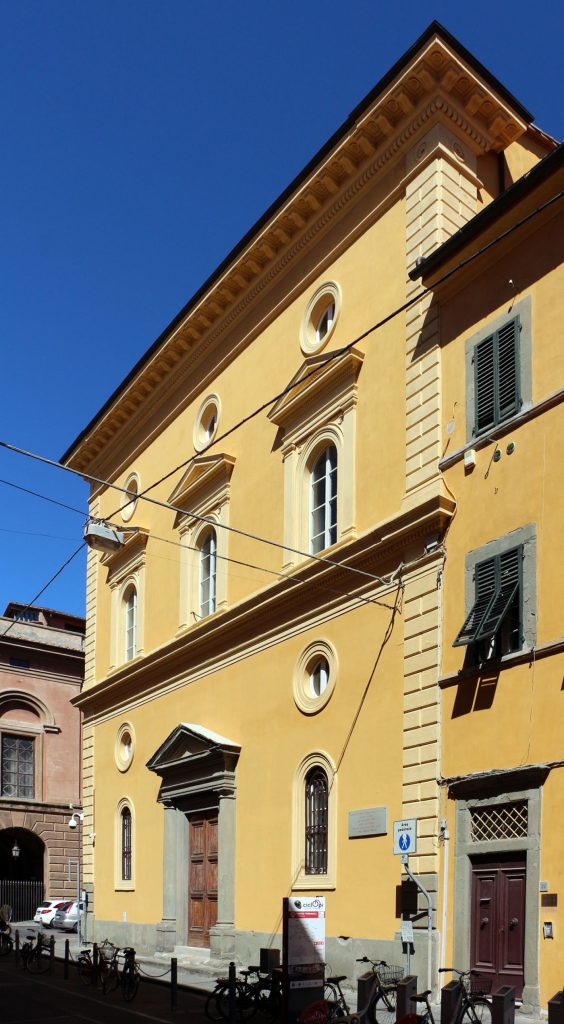 Craftsmen restoring a historic heritage building facade