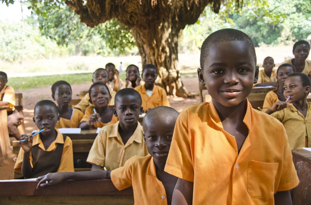 Phones Out of Classrooms: Grades Rise in 16,000-Student Study Pupils studying attentively in a bright classroom without mobile phones